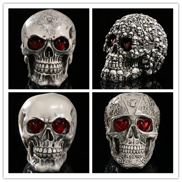 Gothic resin skull LED statues with red glowing eyes in four finishes