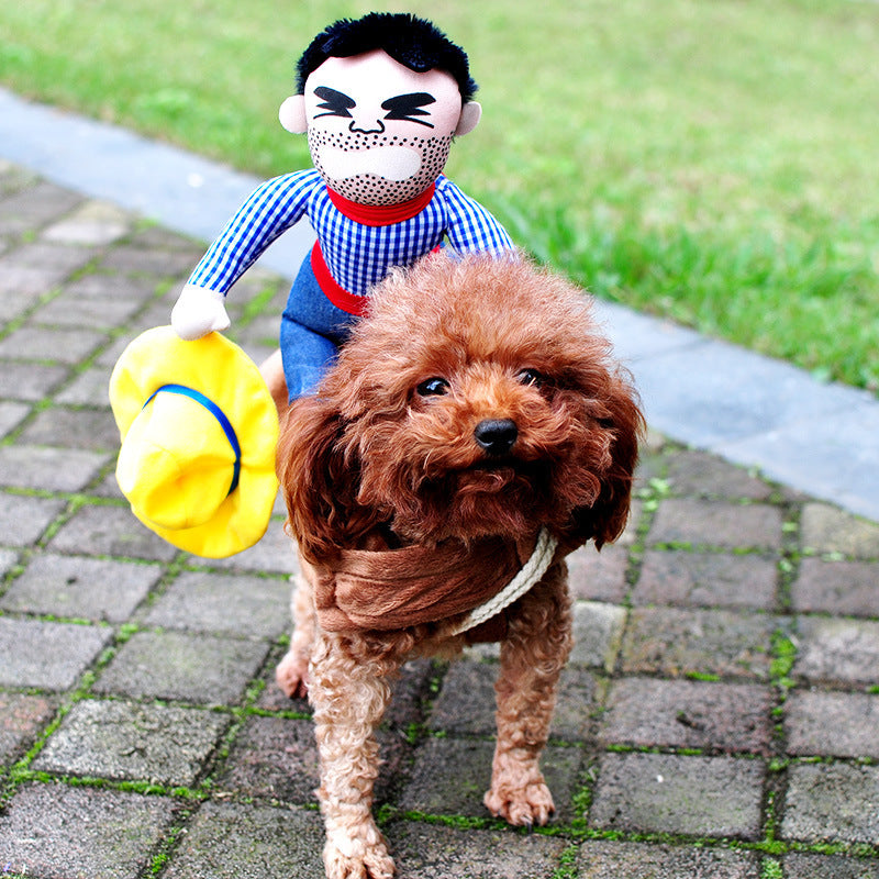 Poodle wearing Halloween Horseman-style pet costume with plush cowboy rider figure and yellow hat prop